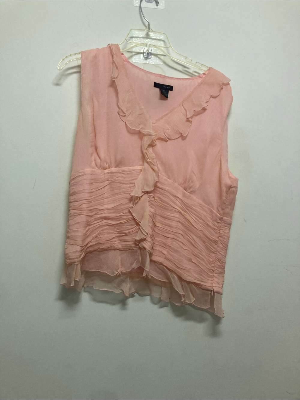 WDNY/2 pcs peach Ruffled Sleeveless Blouse. The camera picks up as light pink.
